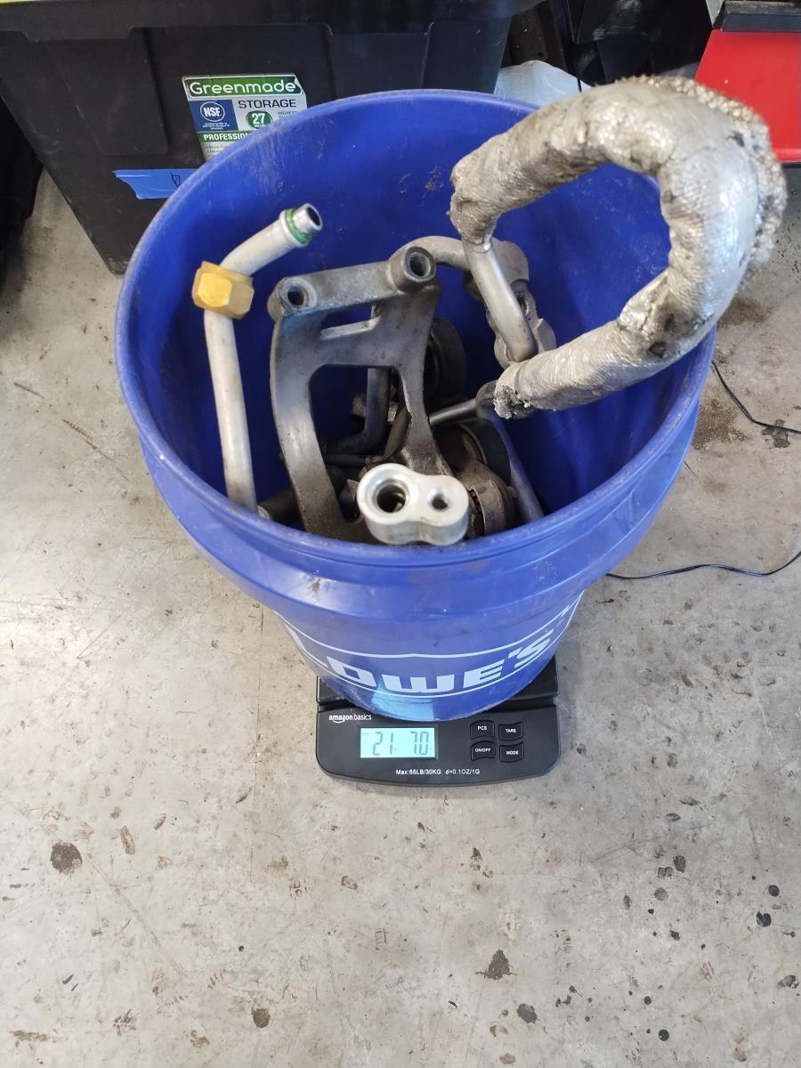 A bucket of C5 corvette air conditioning components weighing in at 21 lbs