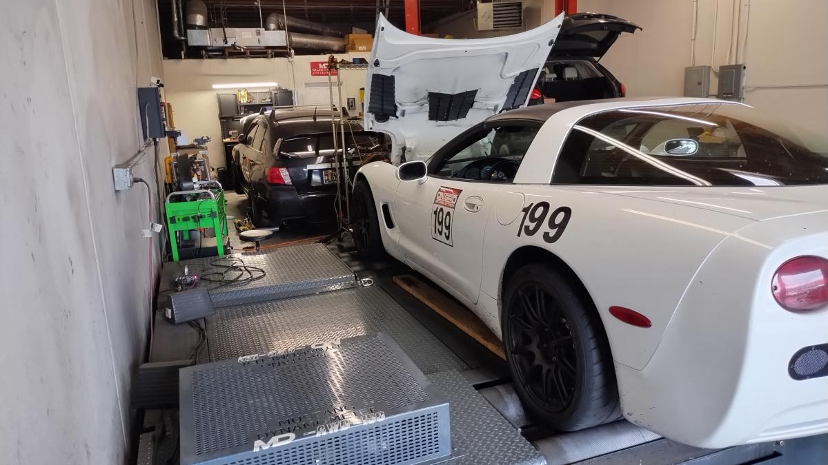 Shred Jesse's White Corvette on a Mustang Dyno, getting ready to take a dyno run.