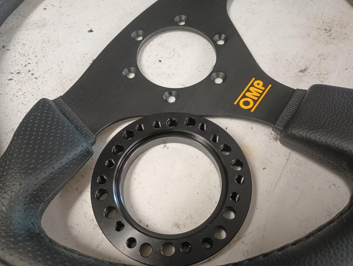 Momo removalbe 330mm steering wheel and half inch spacer awaiting install on a C5 Corvette.
